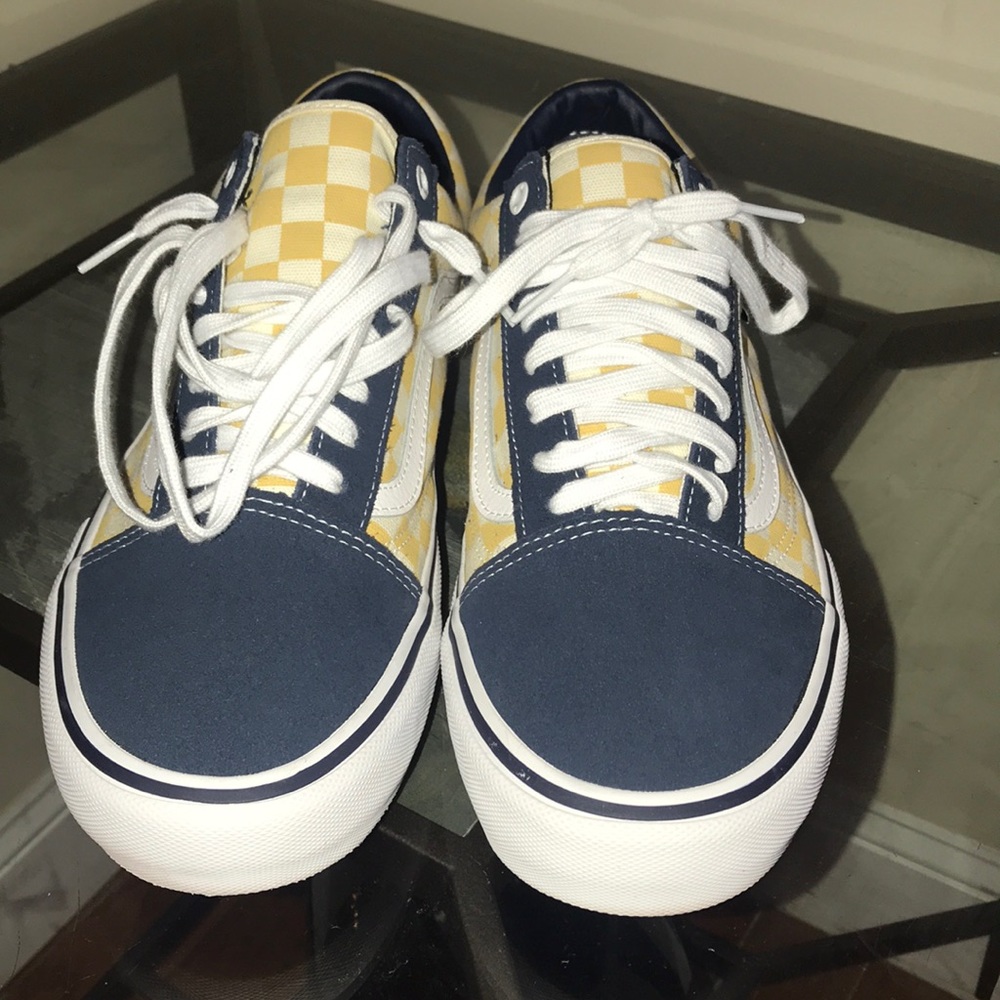 White/blue/yellow Vans
